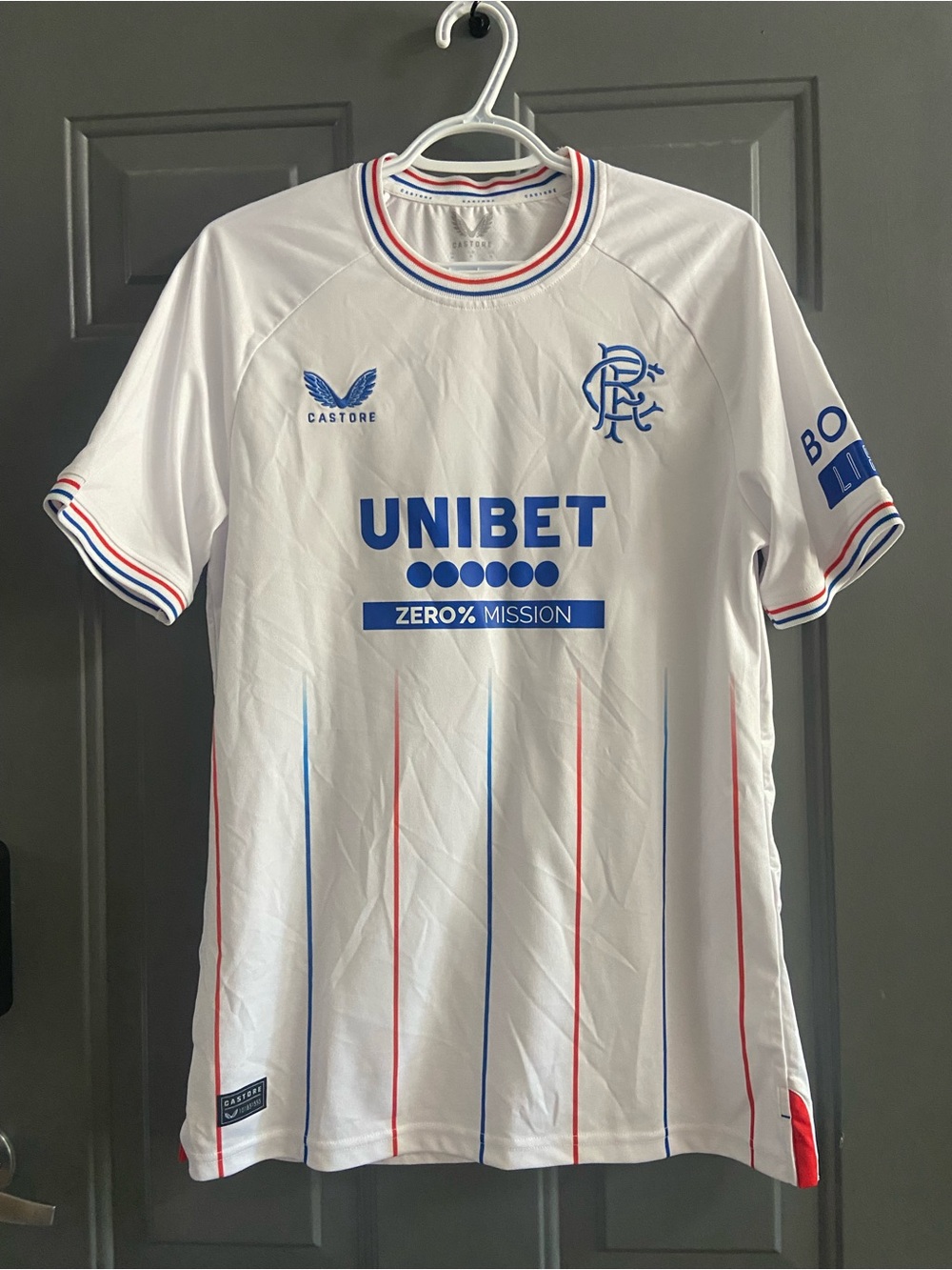 Castore Rangers FC White Home Football Jersey with Blue and Red Trim
